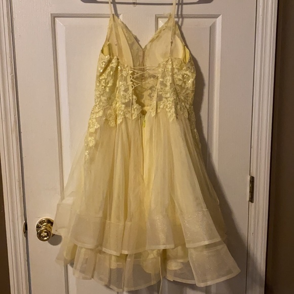 Yellow homecoming dress. Worn once. Has padding and is super pretty! - Picture 2 of 4